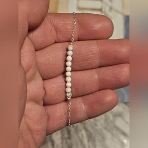 Elegant Silver and White Beaded Bracelet